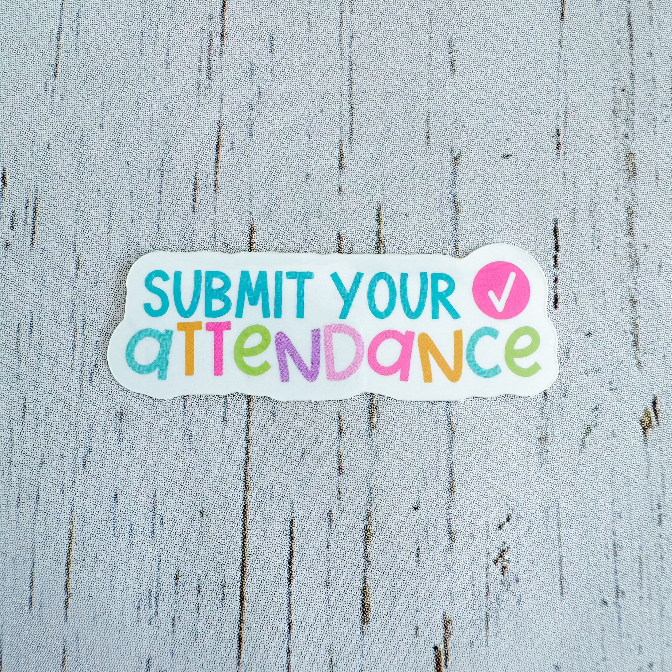 Colorful "Submit Your Attendance" sticker with a pink checkmark, perfect for reminding teachers to take attendance!